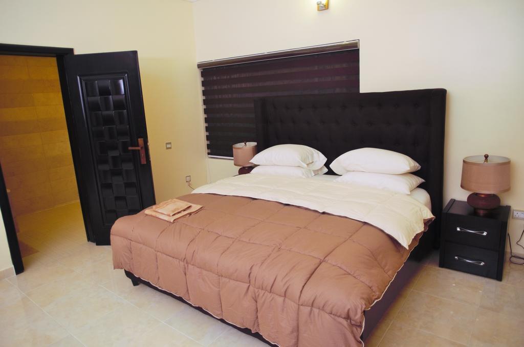 Gemini Place Apartments Лагос Номер фото