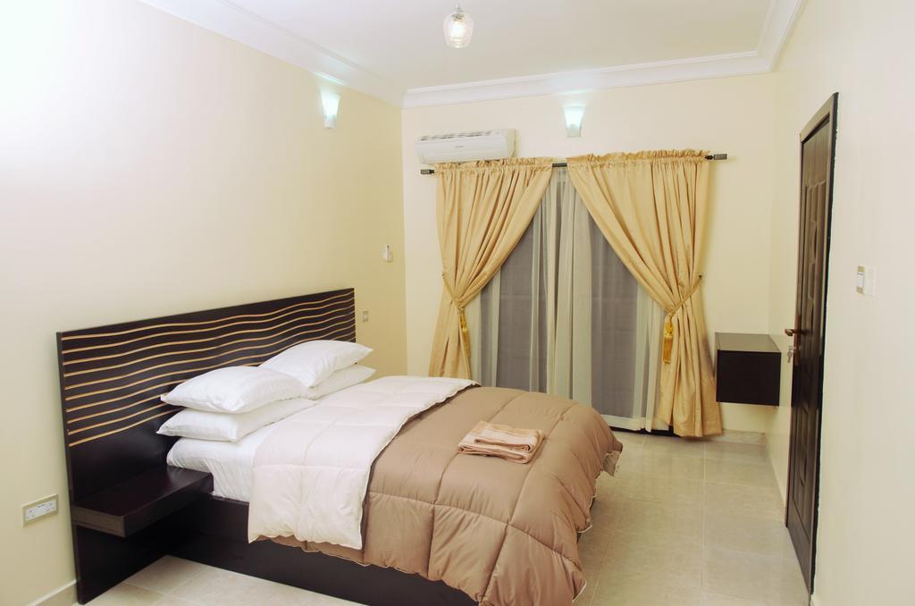 Gemini Place Apartments Лагос Номер фото