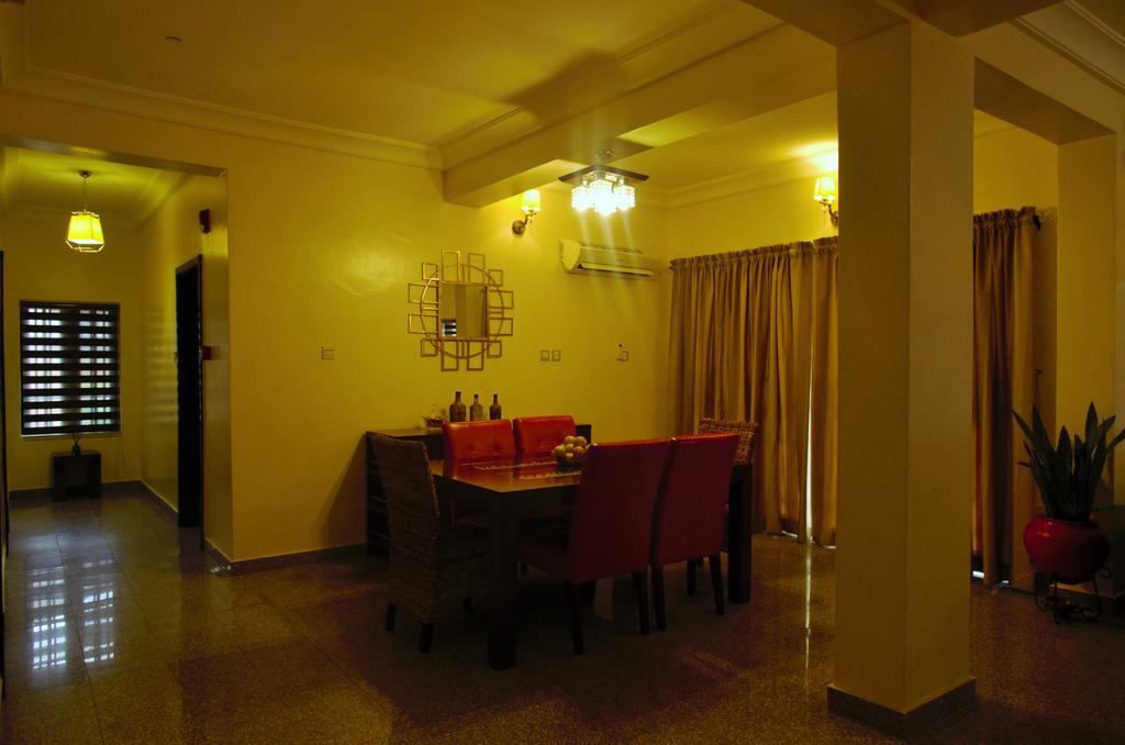 Gemini Place Apartments Лагос Номер фото